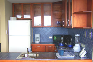 The kitchens have fine wood and tile work.